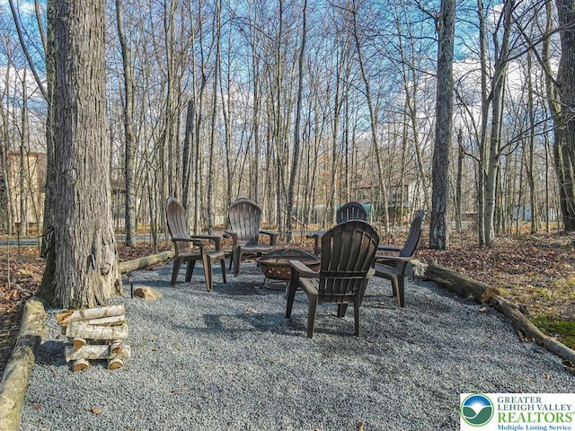 182 Maxatawny Dr, Coolbaugh Twp, PA 18347 - view of yard featuring a fire pit