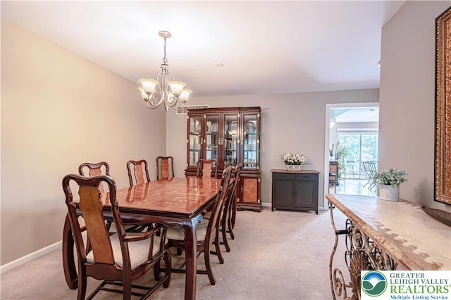 2877 Hope Ridge Dr, Bethlehem Twp, PA 18045 - dining area featuring a chandelier and light colored carpet