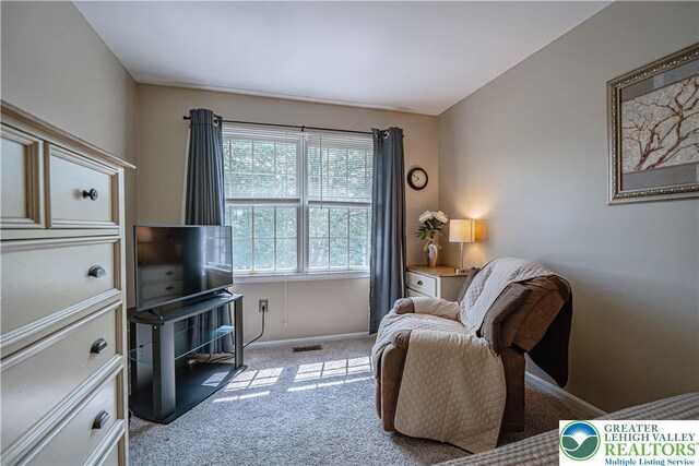 2877 Hope Ridge Dr, Bethlehem Twp, PA 18045 - living area with carpet floors and baseboards