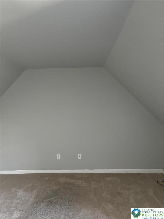 4954 Coatbridge Ln, Lehigh Twp, PA 18088 - bonus room featuring lofted ceiling and carpet floors