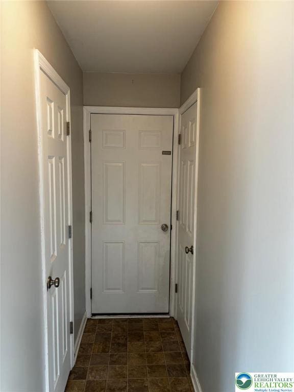 4954 Coatbridge Ln, Lehigh Twp, PA 18088 - hallway featuring stone finish floors