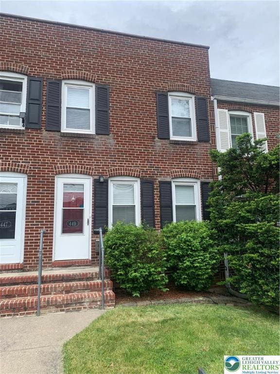 449 E Garrison St, Bethlehem City, PA 18018 - townhome / multi-family property featuring brick siding