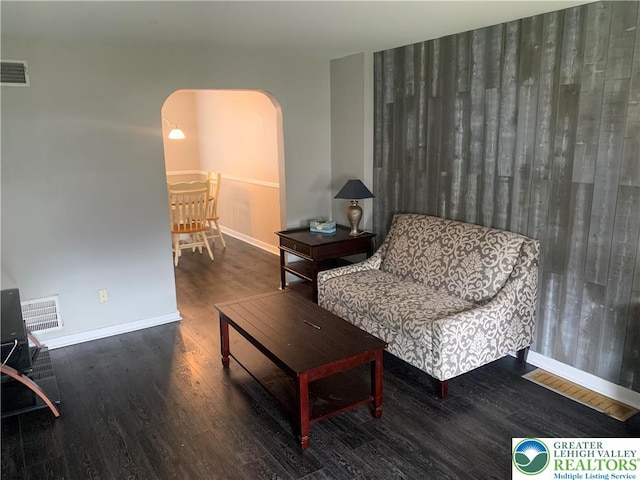 449 E Garrison St, Bethlehem City, PA 18018 - living room featuring arched walkways and wood finished floors
