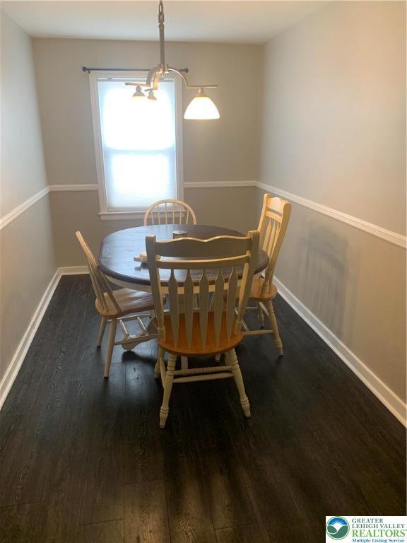 449 E Garrison St, Bethlehem City, PA 18018 - dining room featuring wood finished floors and a chandelier