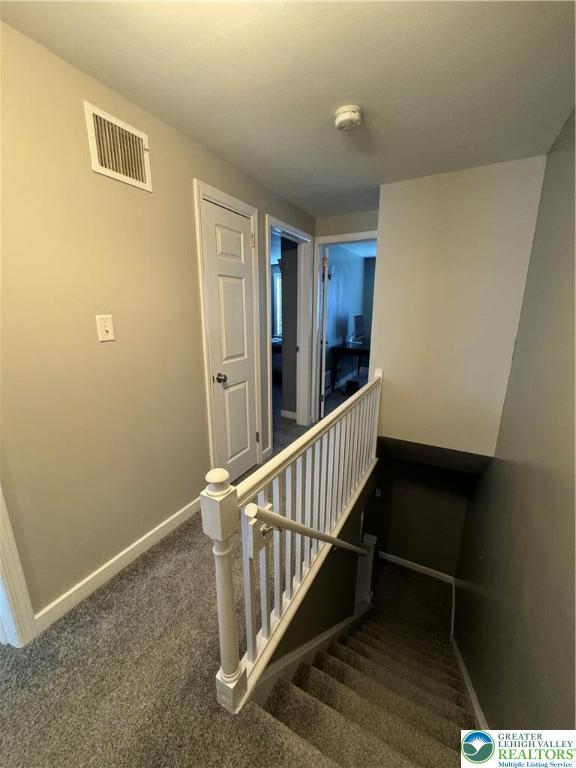 449 E Garrison St, Bethlehem City, PA 18018 - staircase featuring carpet floors and baseboards