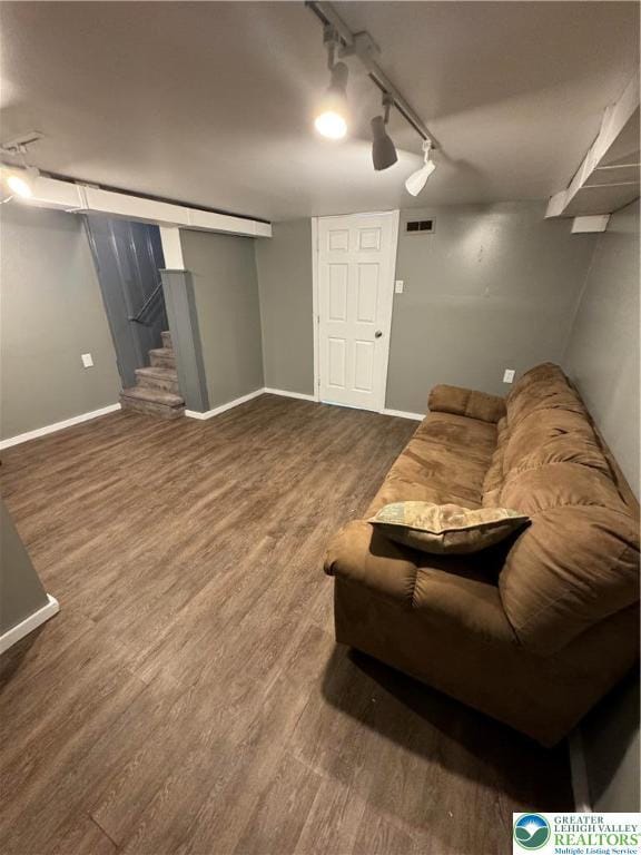 449 E Garrison St, Bethlehem City, PA 18018 - sitting room featuring wood finished floors, rail lighting, and stairway
