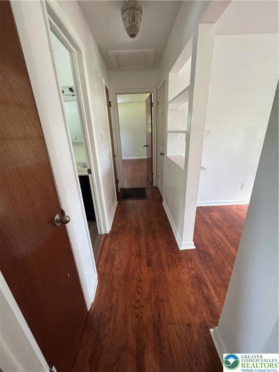 84 Moorestown Dr, Moore Twp, PA 18014 - hallway with attic access and wood finished floors