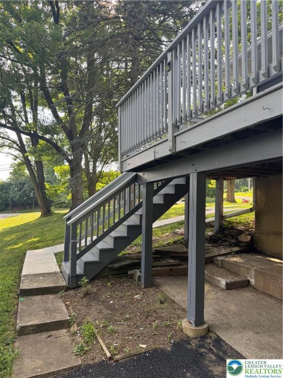 84 Moorestown Dr, Moore Twp, PA 18014 - deck featuring stairs and a lawn