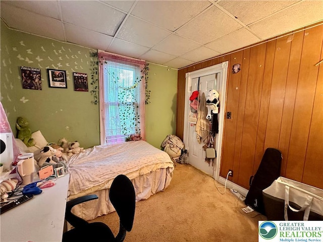 189 W 27th St, Northampton Boro, PA 18067 - bedroom featuring light carpet, a paneled ceiling, and wooden walls