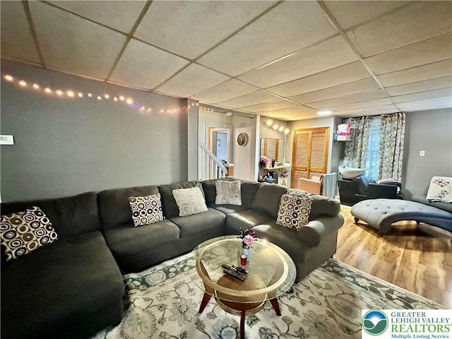 189 W 27th St, Northampton Boro, PA 18067 - living room featuring a paneled ceiling, wood finished floors, and stairway