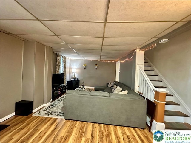 189 W 27th St, Northampton Boro, PA 18067 - living area featuring a drop ceiling, wood finished floors, and stairway