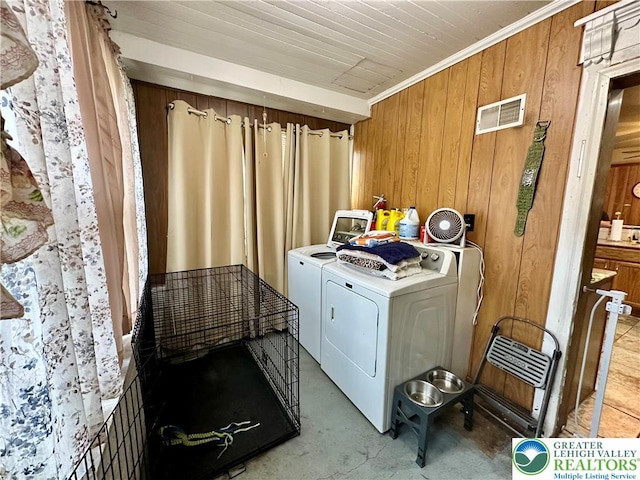 189 W 27th St, Northampton Boro, PA 18067 - laundry area featuring independent washer and dryer, wooden walls, and ornamental molding