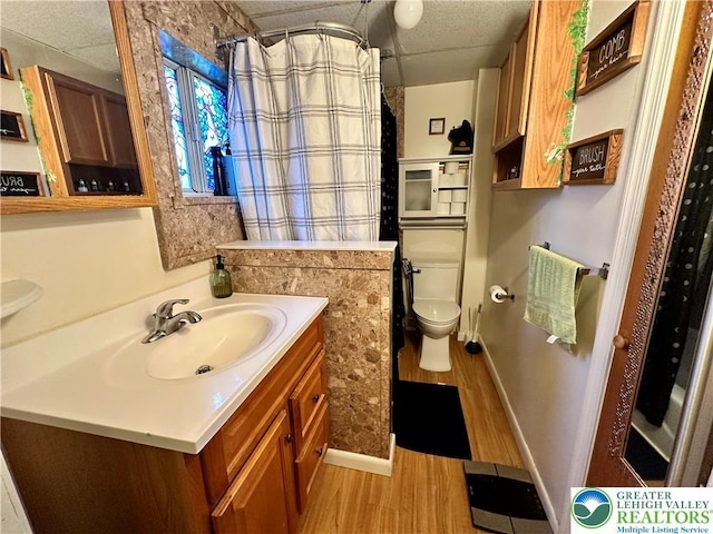 189 W 27th St, Northampton Boro, PA 18067 - bathroom featuring wood finished floors, vanity, and curtained shower