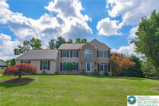 2029 Amherst Dr, Lower Saucon Twp, PA 18015 - colonial house featuring a front lawn