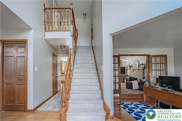 2029 Amherst Dr, Lower Saucon Twp, PA 18015 - stairway featuring wood finished floors and french doors