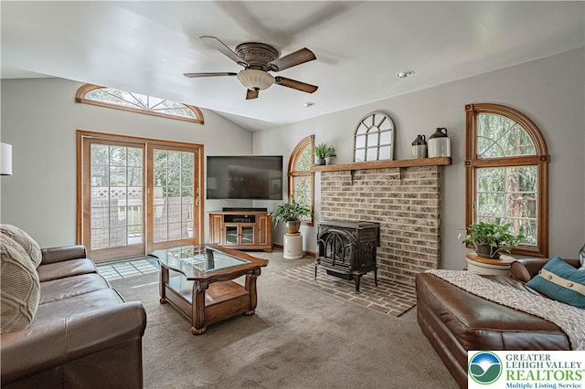 2029 Amherst Dr, Lower Saucon Twp, PA 18015 - carpeted living area featuring a wood stove, ceiling fan, vaulted ceiling, and recessed lighting