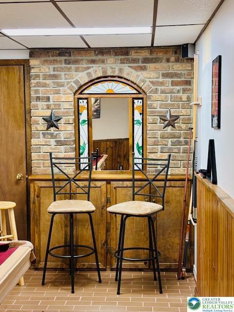 2734 Old Bethlehem Pike, Milford Twp, PA 18951 - bar area with wainscoting and wood walls