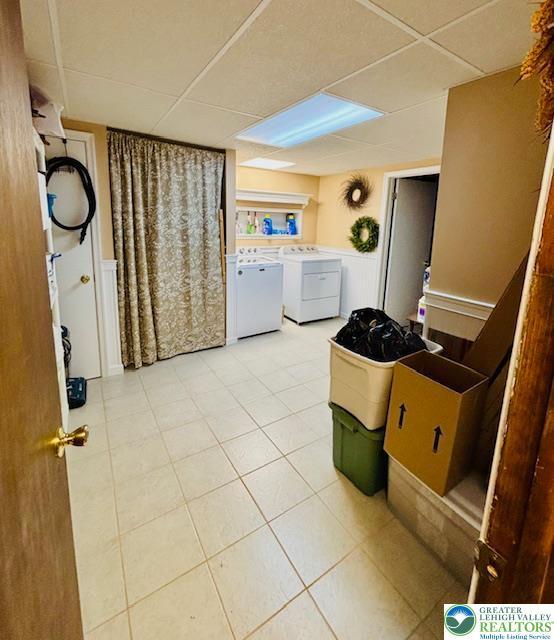 2734 Old Bethlehem Pike, Milford Twp, PA 18951 - laundry room with washer and clothes dryer and light tile patterned floors
