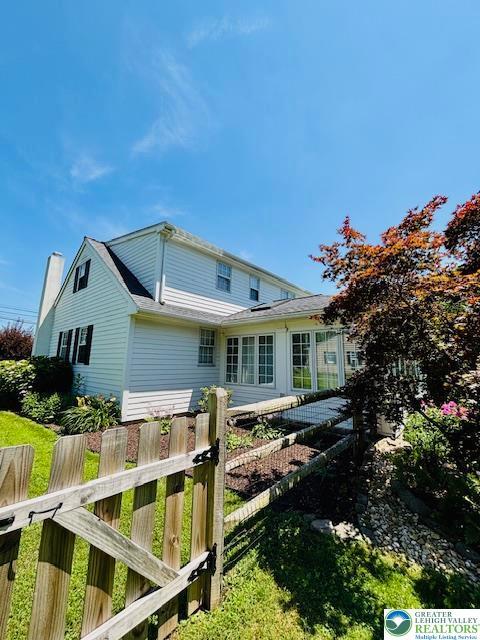 2734 Old Bethlehem Pike, Milford Twp, PA 18951 - back of property featuring a chimney