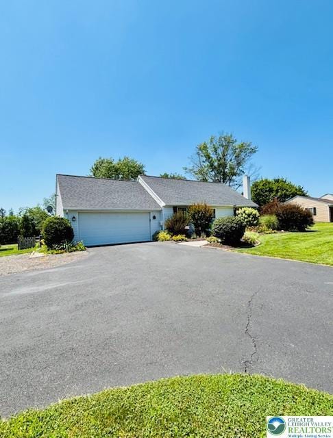 2734 Old Bethlehem Pike, Milford Twp, PA 18951 - ranch-style house with an attached garage, driveway, and a front yard