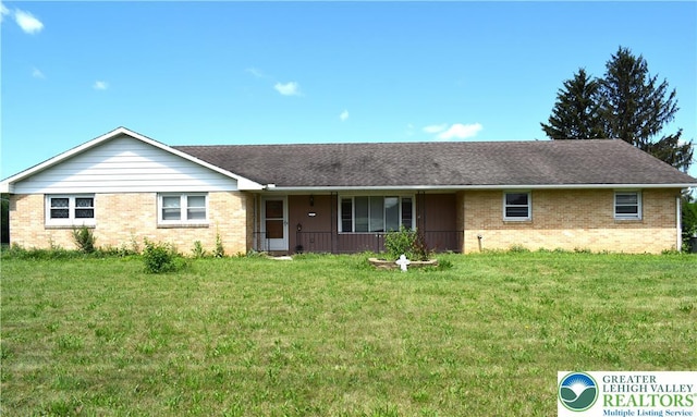 2841 Willow St, North Whitehall Twp, PA 18037 - ranch-style home featuring brick siding and a front lawn