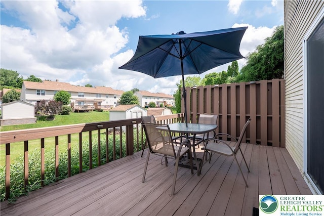 2721 Victoria Ln, Easton, PA 18045 - deck featuring a shed, outdoor dining area, and a lawn