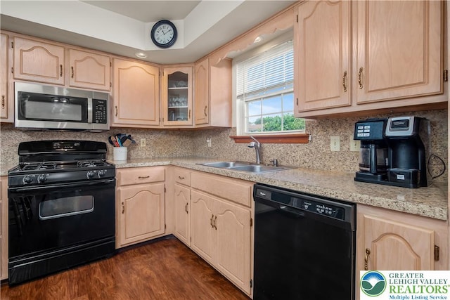 2721 Victoria Ln, Easton, PA 18045 - kitchen featuring black appliances, light brown cabinets, light countertops, dark wood-style floors, and tasteful backsplash