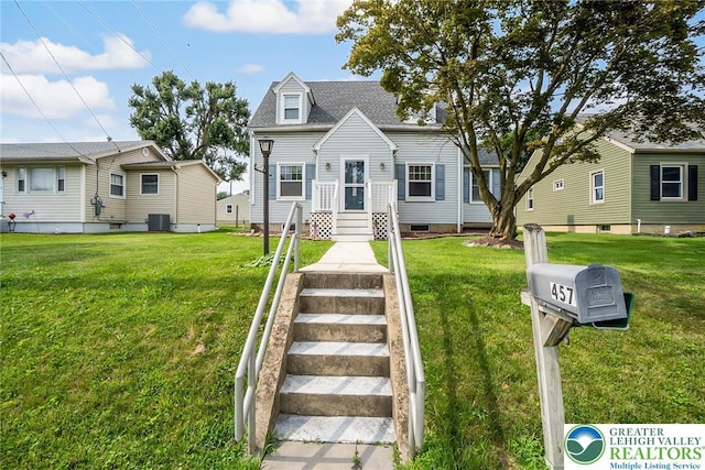 457 E Lawn Rd, Upper Nazareth Twp, PA 18064 - cape cod house featuring a front yard and a shingled roof
