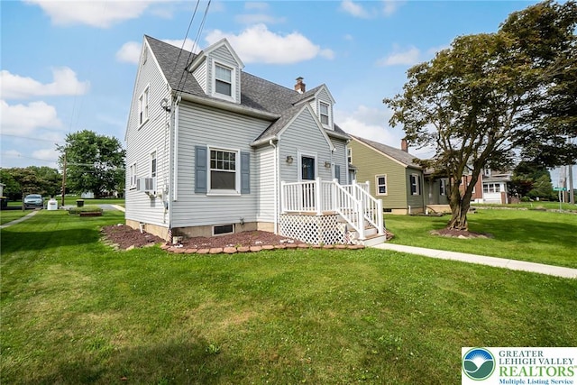 457 E Lawn Rd, Upper Nazareth Twp, PA 18064 - cape cod house with a front yard, a shingled roof, and a chimney
