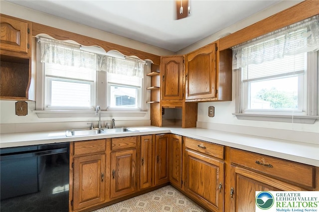 457 E Lawn Rd, Upper Nazareth Twp, PA 18064 - kitchen featuring dishwasher, brown cabinetry, light countertops, and open shelves