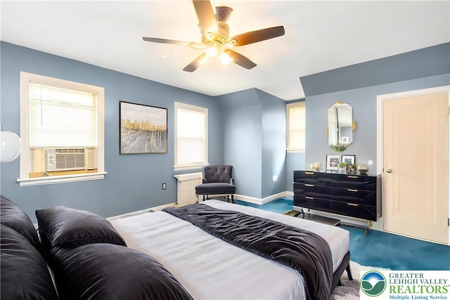 457 E Lawn Rd, Upper Nazareth Twp, PA 18064 - carpeted bedroom with cooling unit, radiator, and a ceiling fan