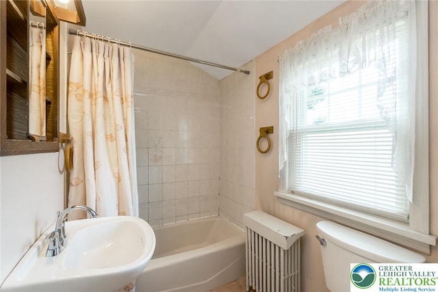 457 E Lawn Rd, Upper Nazareth Twp, PA 18064 - bathroom featuring radiator and shower / bath combo with shower curtain