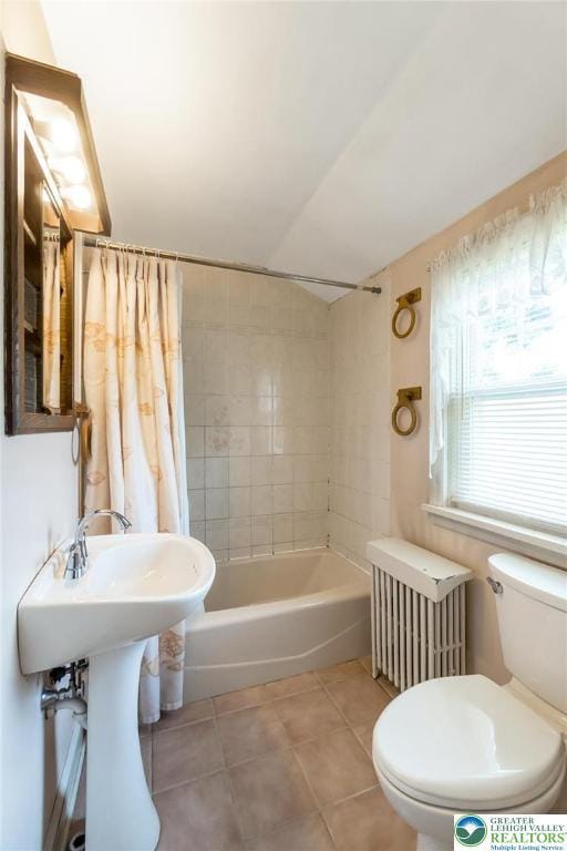 457 E Lawn Rd, Upper Nazareth Twp, PA 18064 - full bath with tile patterned floors, shower / tub combo, and radiator heating unit