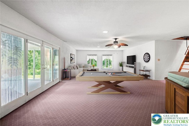 242 Schoeneck Ave, Nazareth Boro, PA 18064 - rec room with carpet, a ceiling fan, a textured ceiling, and french doors