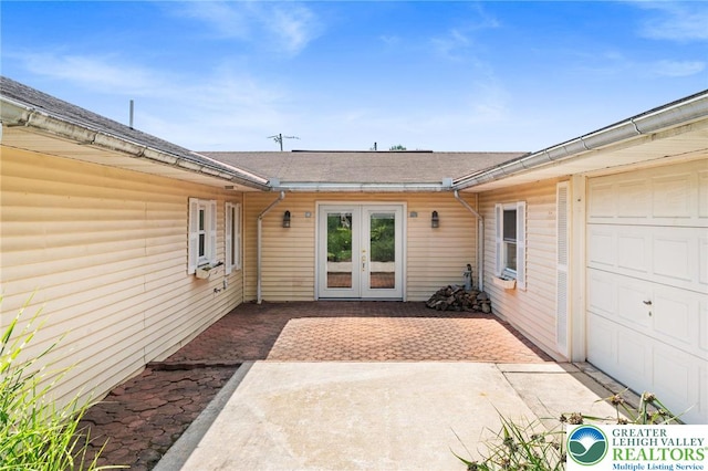 242 Schoeneck Ave, Nazareth Boro, PA 18064 - doorway to property with a shingled roof and french doors