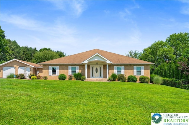 242 Schoeneck Ave, Nazareth Boro, PA 18064 - ranch-style home featuring brick siding and a front yard