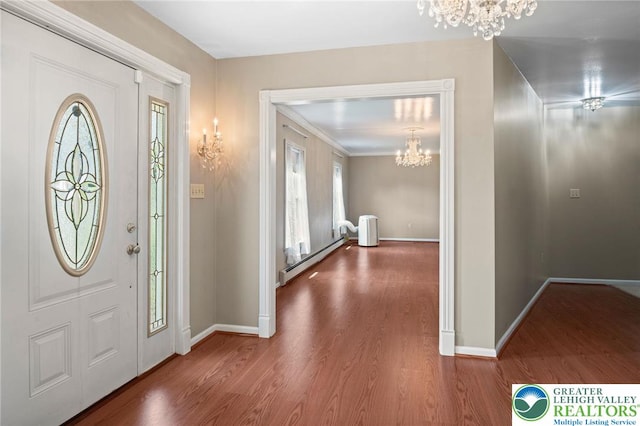 242 Schoeneck Ave, Nazareth Boro, PA 18064 - foyer with a chandelier, baseboard heating, and wood finished floors