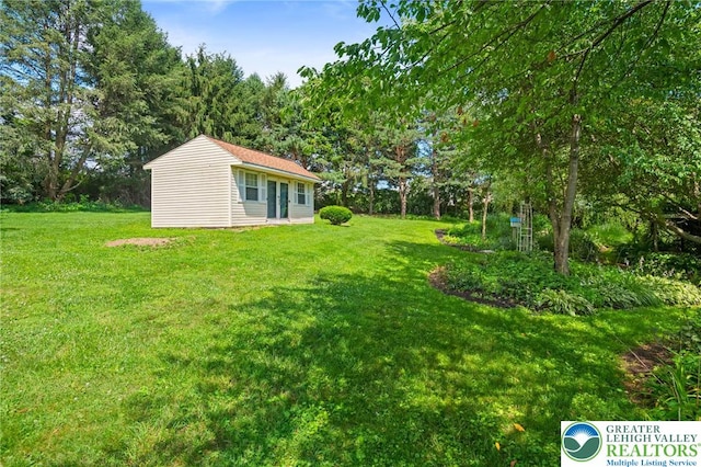 242 Schoeneck Ave, Nazareth Boro, PA 18064 - view of green lawn with an outdoor structure