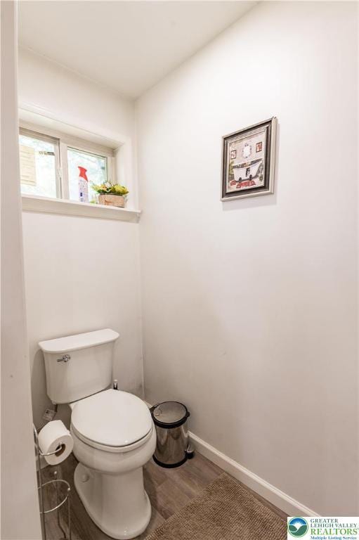 1555 Longleaf Dr, Chestnuthill Twp, PA 18330 - bathroom featuring toilet and wood finished floors