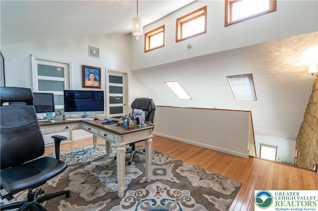 1555 Longleaf Dr, Chestnuthill Twp, PA 18330 - office space with wood finished floors and high vaulted ceiling