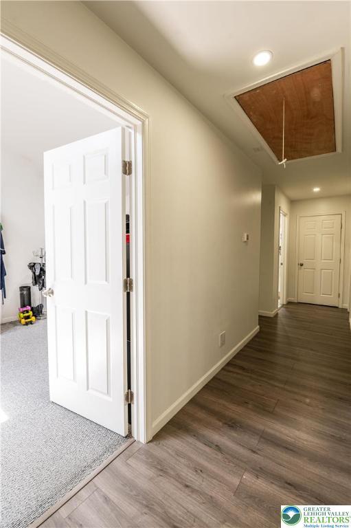 1555 Longleaf Dr, Chestnuthill Twp, PA 18330 - hallway featuring attic access, wood finished floors, and recessed lighting