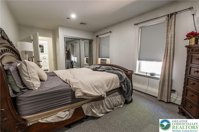 1555 Longleaf Dr, Chestnuthill Twp, PA 18330 - carpeted bedroom with a closet and a baseboard radiator