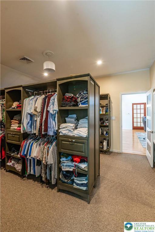1555 Longleaf Dr, Chestnuthill Twp, PA 18330 - spacious closet featuring carpet flooring and french doors