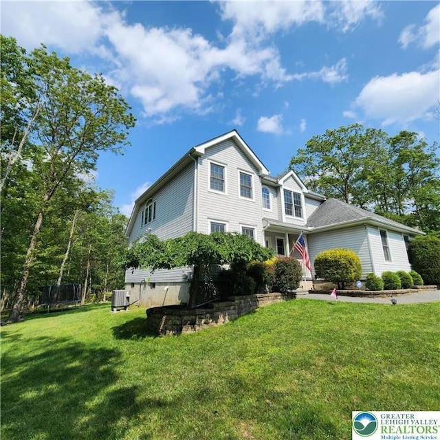 408 Sassafrass Way, Jackson Twp, PA 18360 - traditional home featuring a front lawn
