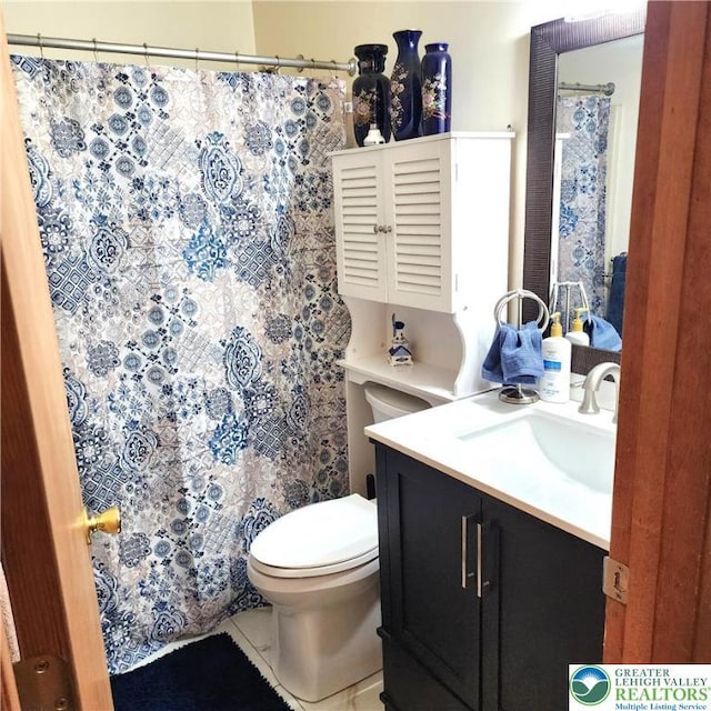408 Sassafrass Way, Jackson Twp, PA 18360 - bathroom with vanity, curtained shower, and tile patterned flooring