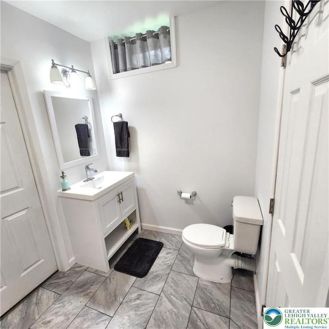 408 Sassafrass Way, Jackson Twp, PA 18360 - half bathroom with vanity and marble finish flooring