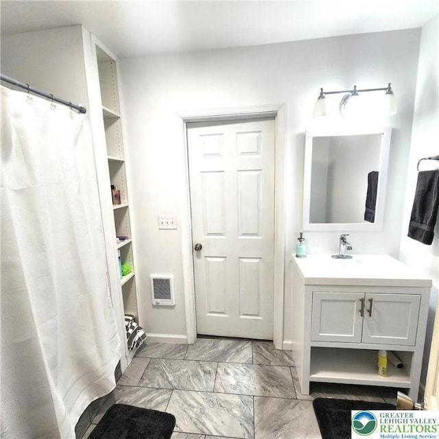 408 Sassafrass Way, Jackson Twp, PA 18360 - full bathroom with vanity and marble look tile flooring