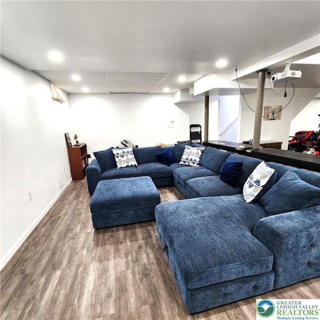 408 Sassafrass Way, Jackson Twp, PA 18360 - living room featuring wood finished floors and recessed lighting