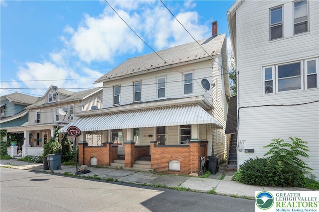 35 N 3rd St, Bangor Boro, PA 18013 - traditional-style home featuring covered porch and brick siding