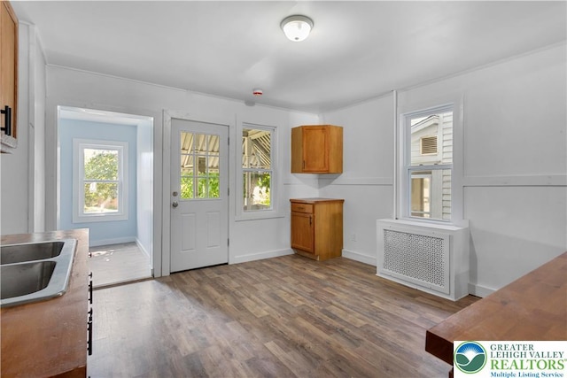 35 N 3rd St, Bangor Boro, PA 18013 - kitchen with radiator, wood finished floors, and brown cabinets